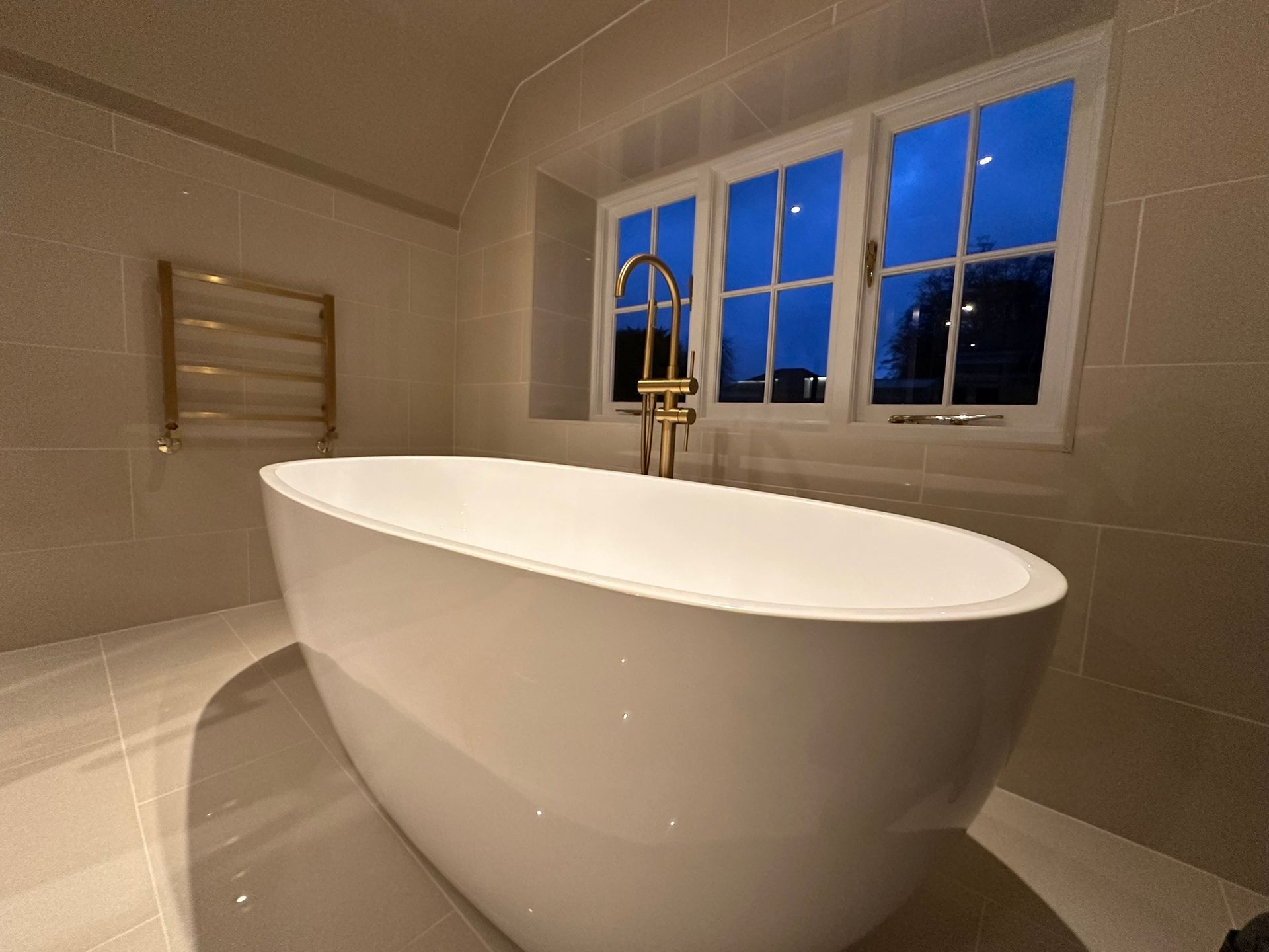 silver tap and sink