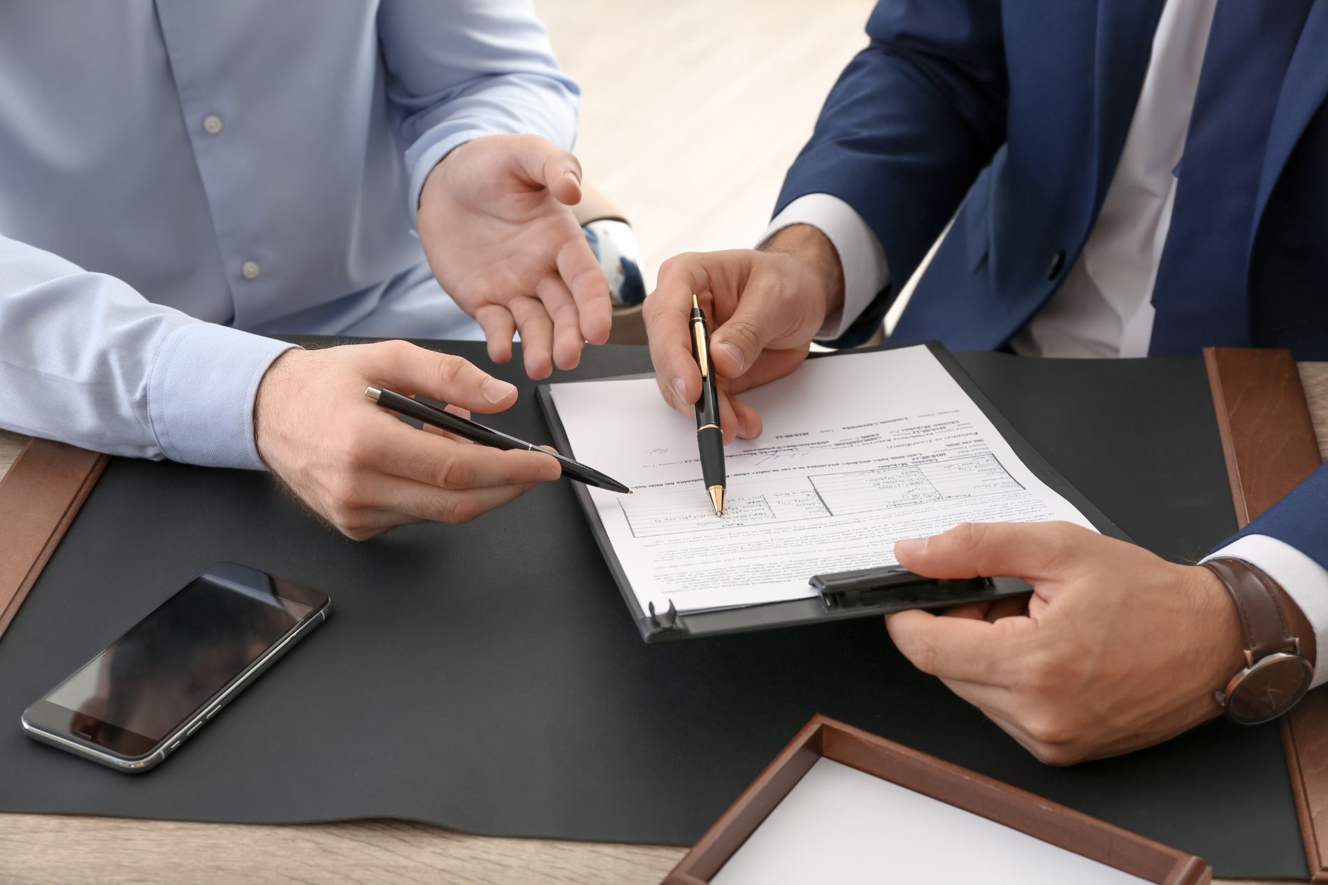 Probate planner and client reviewing documents