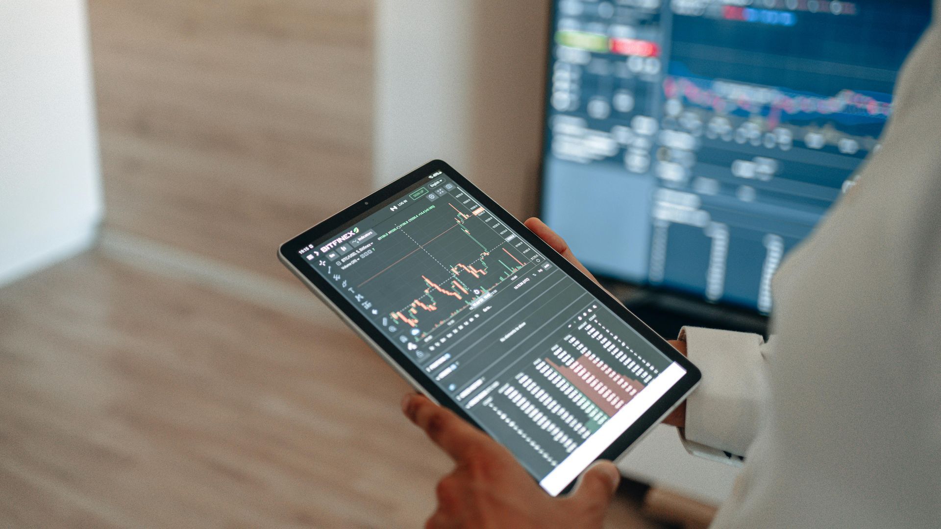 T3 Cloud Technologies services with a woman looking at her new CRM and data on an ipad