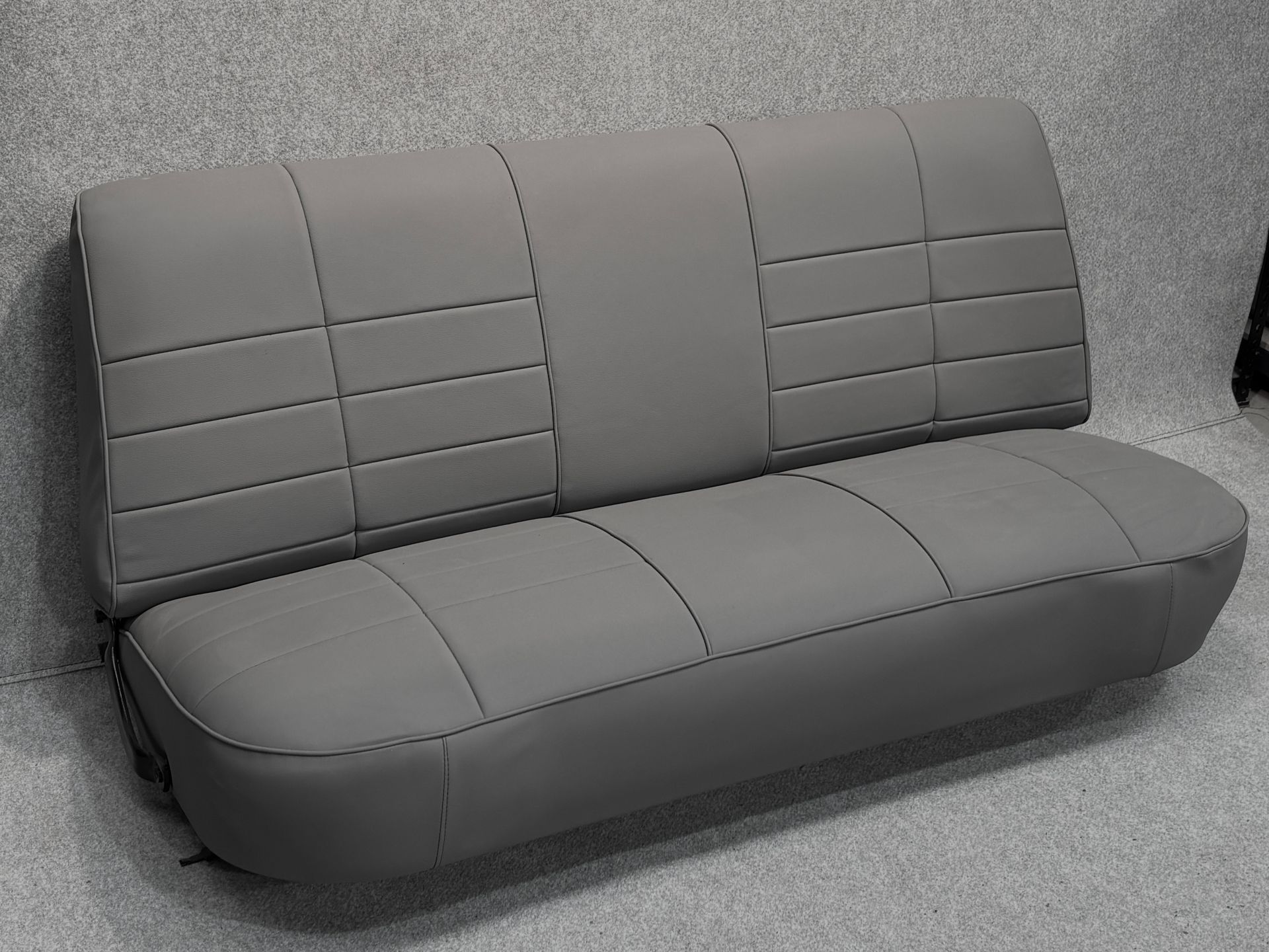 1953 International AR162 truck bench seat in Magic Calypso Mako with back sewn pleats