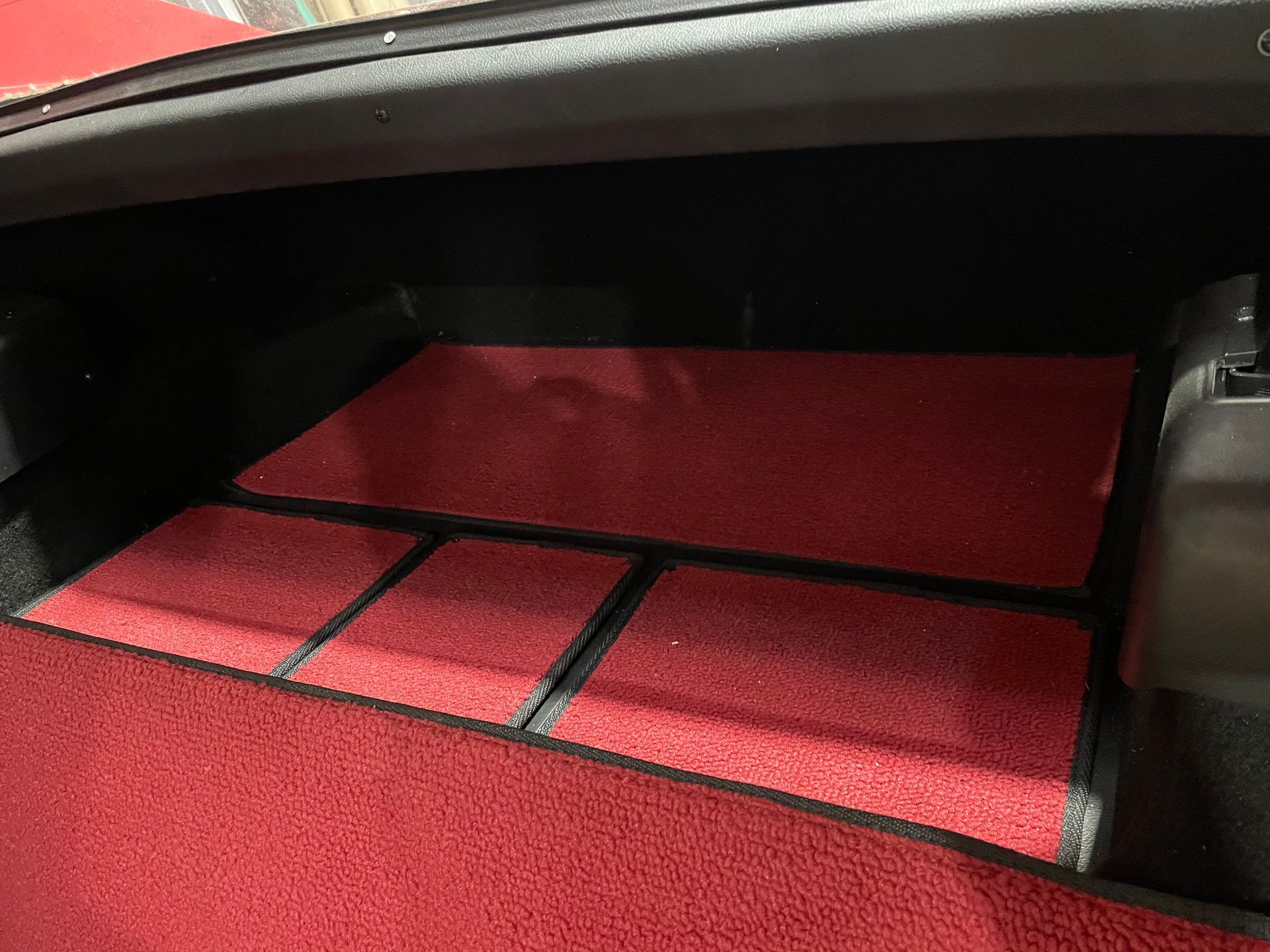 1976 Corvette Stingray custom red and black carpet