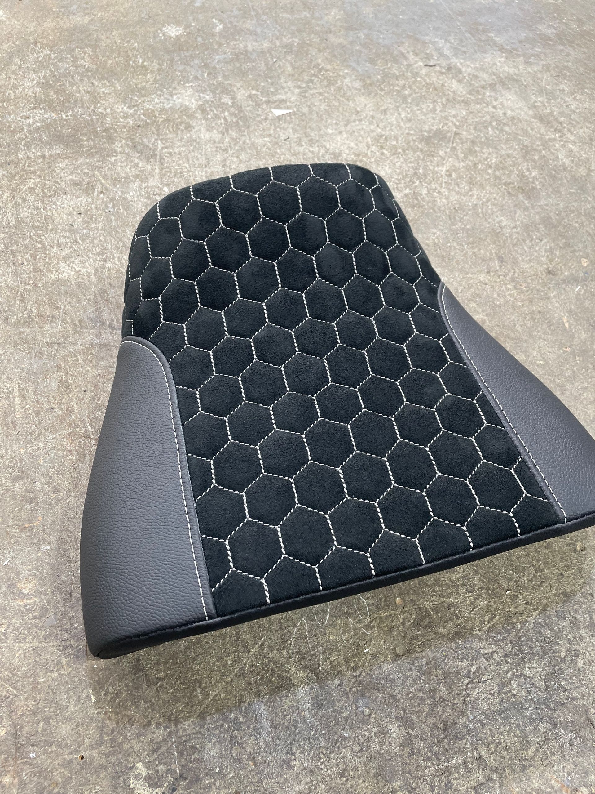 Black vinyl with honeycomb suede insert