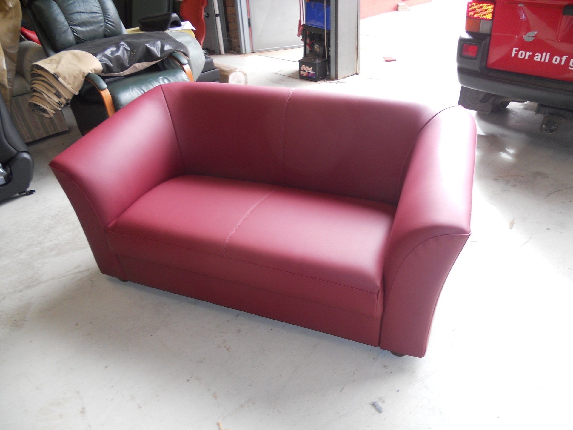 Burgundy leather sofa
