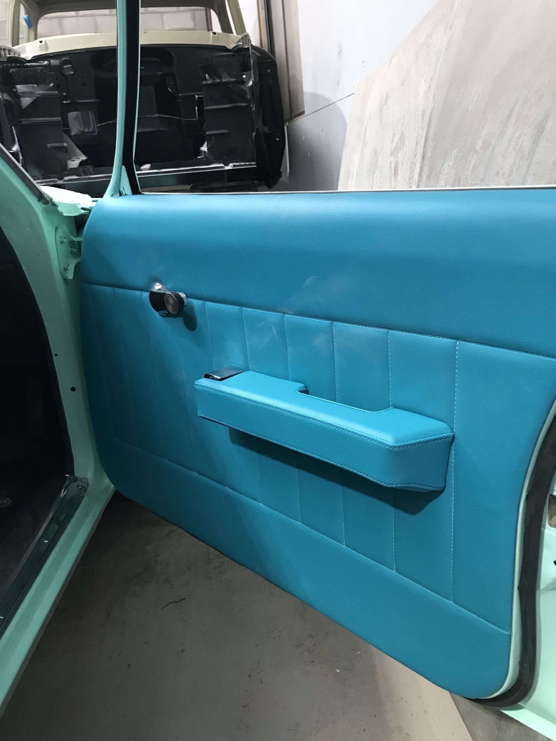 Custom wrapped Kingswood door trim and armrest