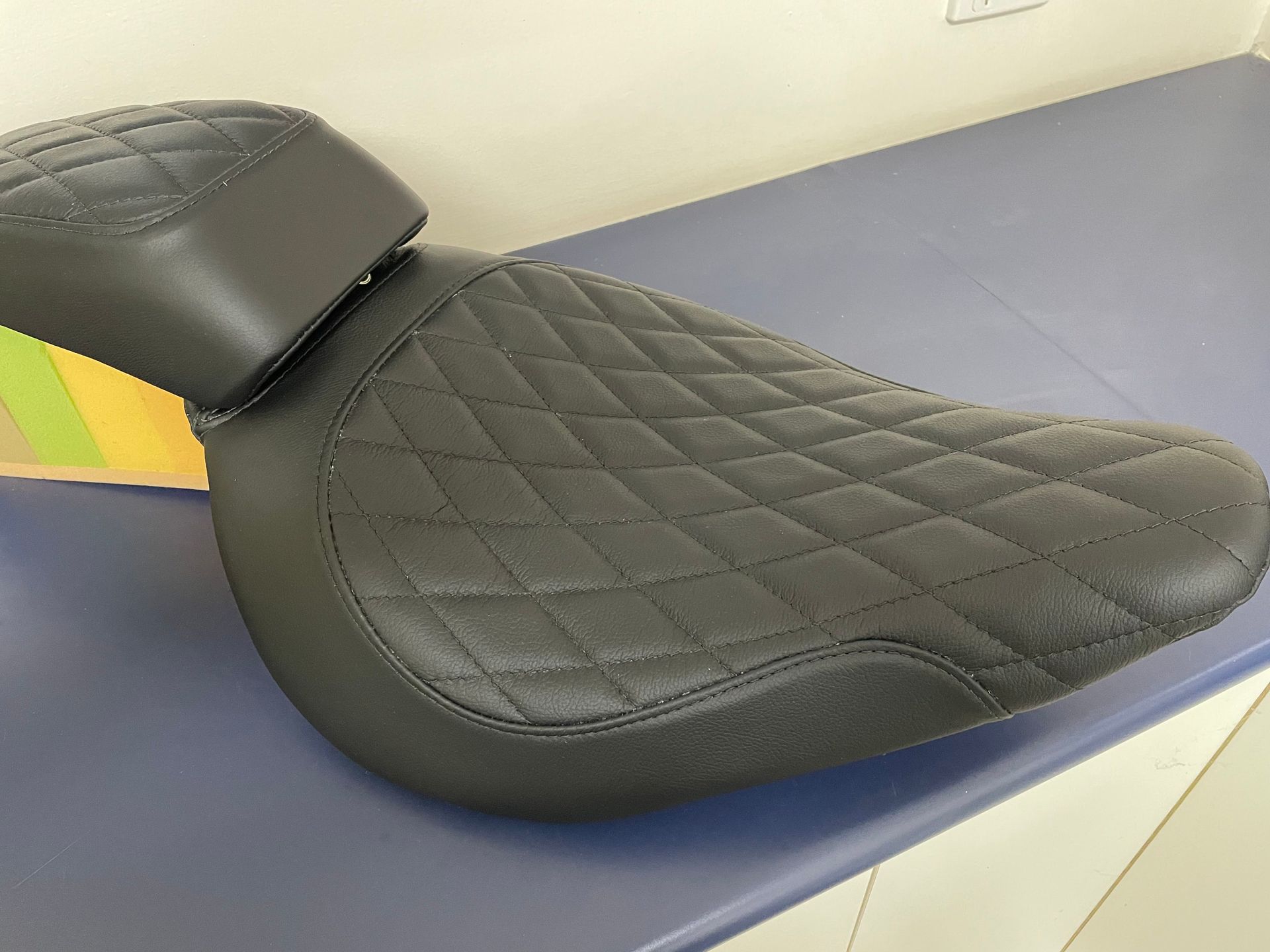 Custom black leather cross stitch motorbike seat