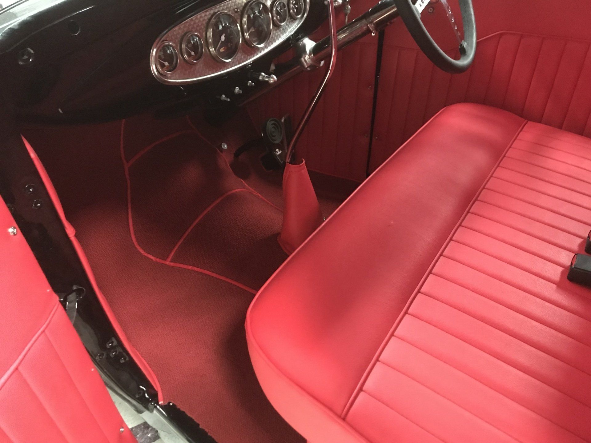 Ford Model A sport roadster red leather interior