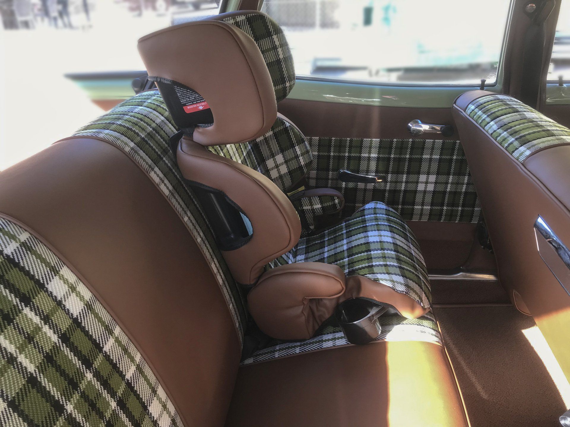 HT Holden Kingswood wagon brown vinyl with green tartan booster seat