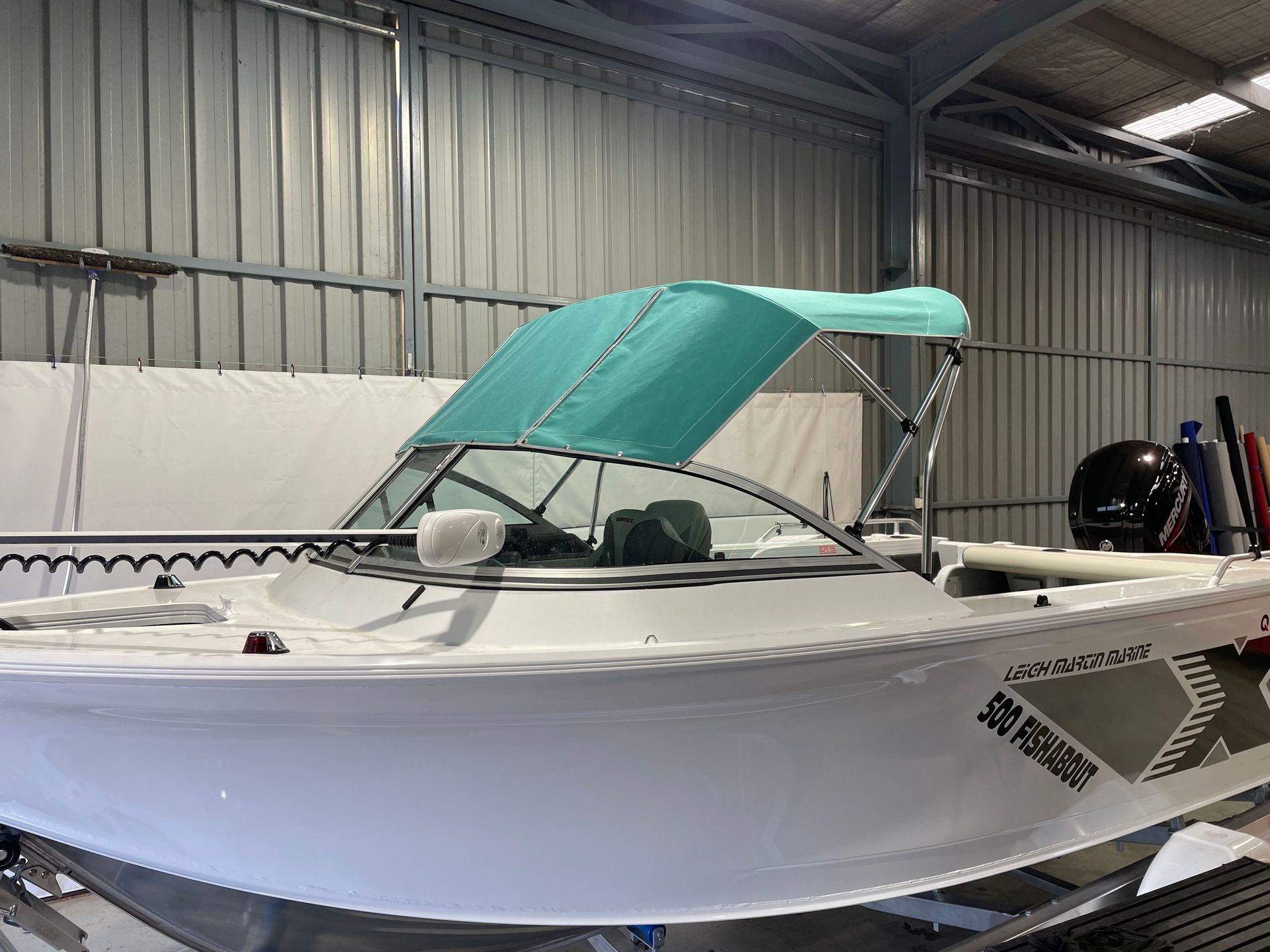 Quintrex 500 Fishabout green canvas canopy