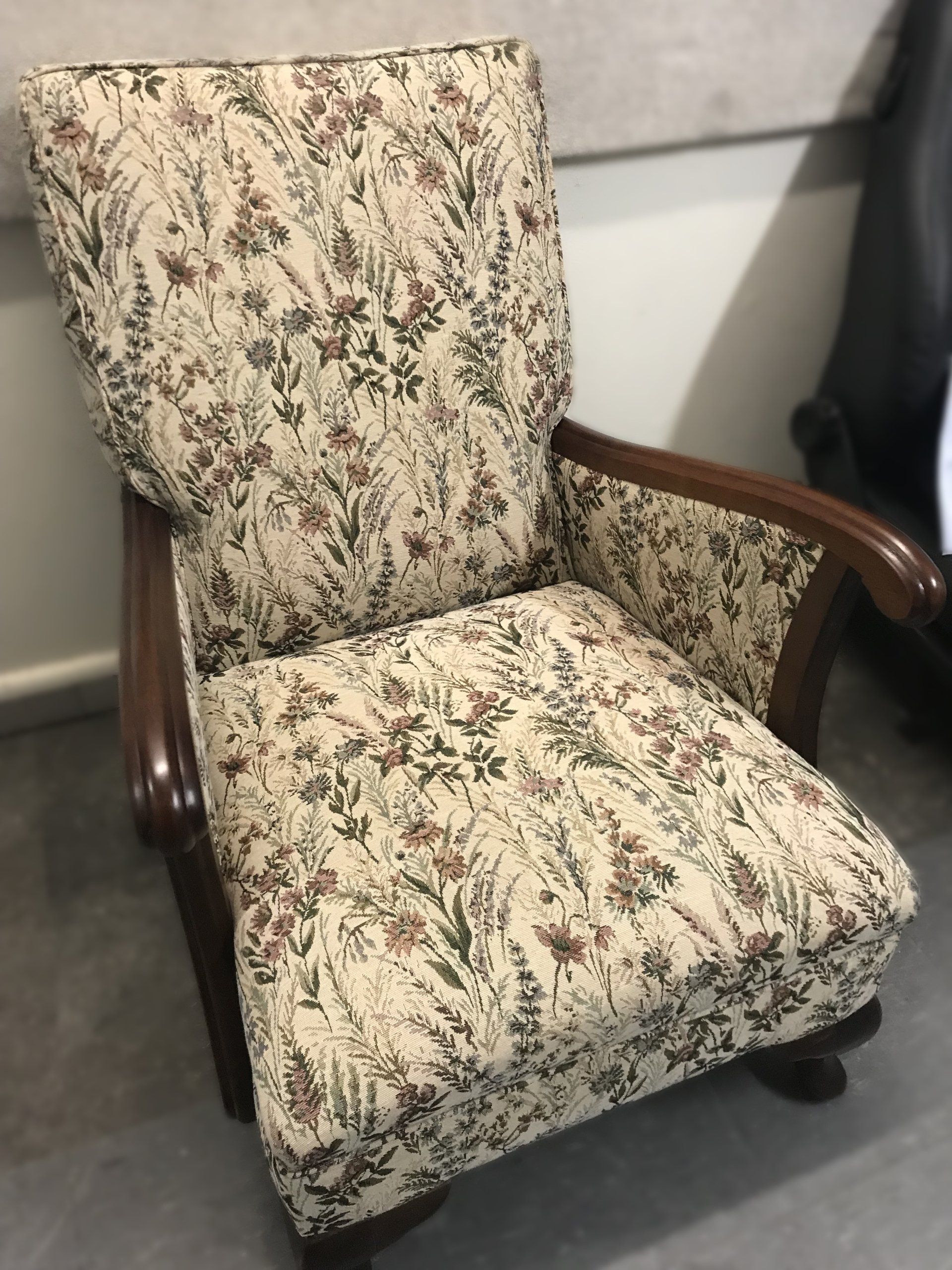 Restored antique lounge chair with native floral print
