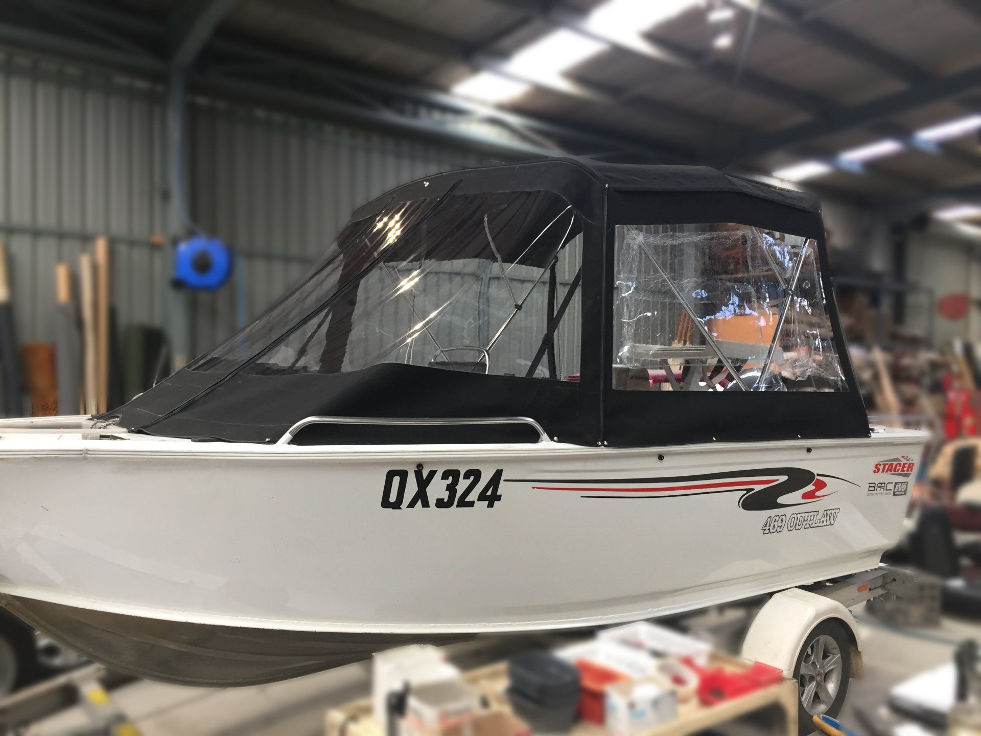 Stacer 469 Outlaw bimini with camping clears
