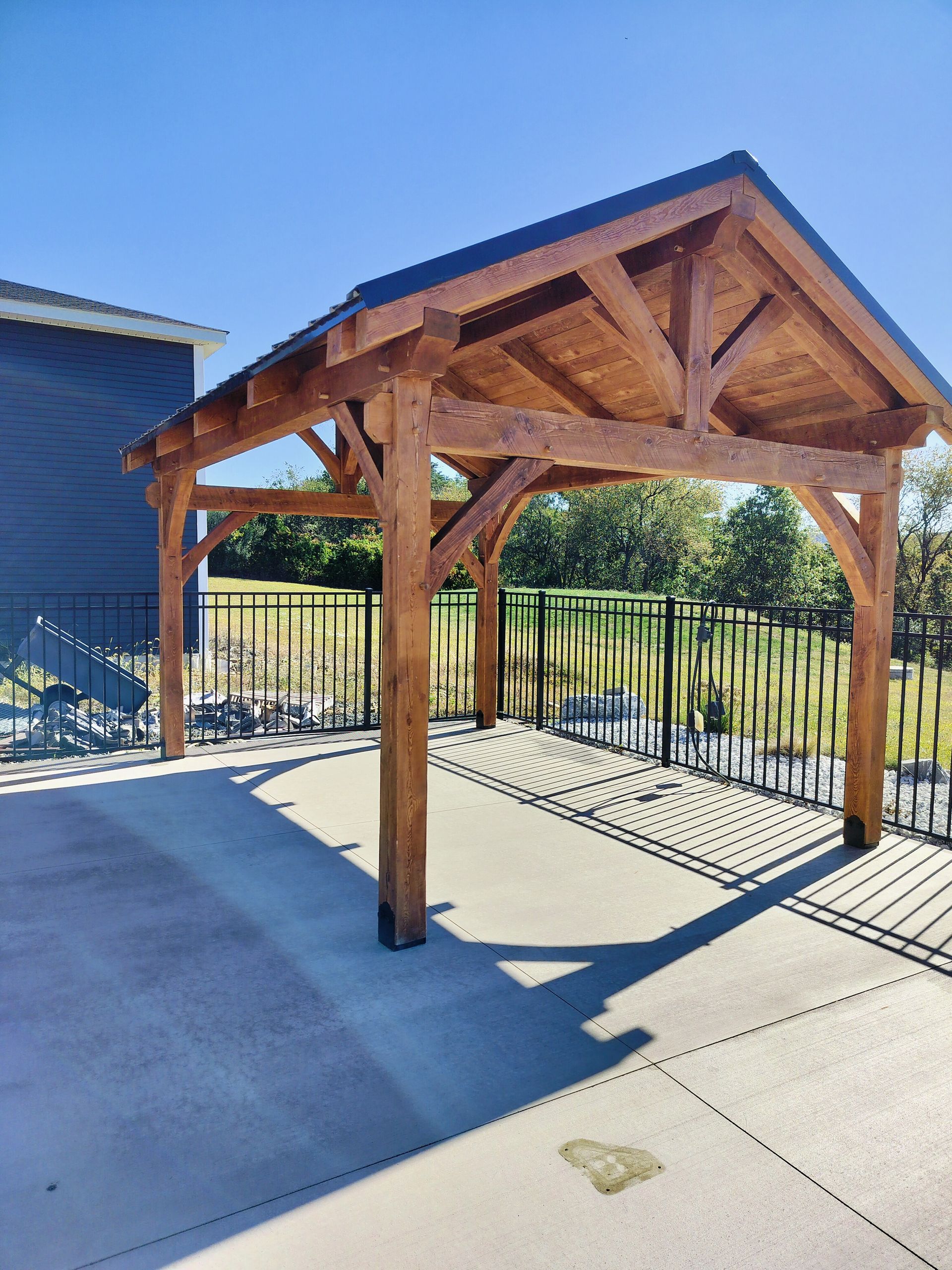 A wooden timber-frame pavilion byCentral Timber Frame Supply available for wholesale across the United States