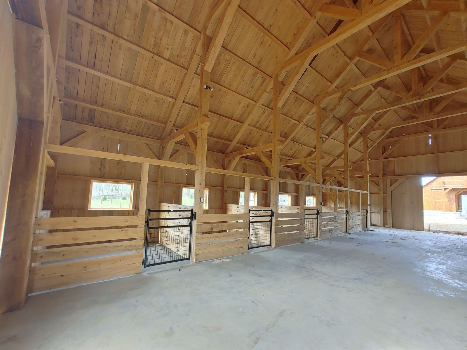 Large timber-frame barn by CTFS serving Pennsylvania, West Virginia, Virginia, New Jersey, New York, Ohio, Illinois.