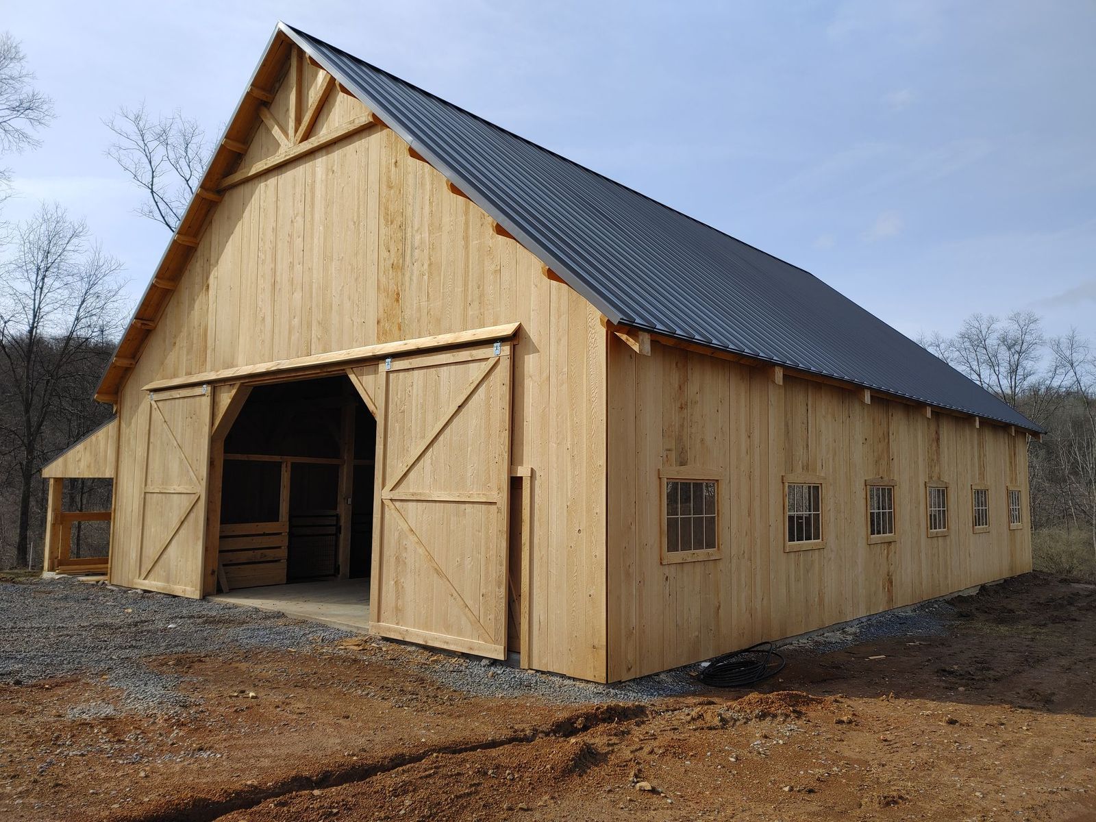 A large wooden barn by CTFS Pennsylvania, West Virginia, Virginia, New Jersey, New York, Ohio, Illinois.