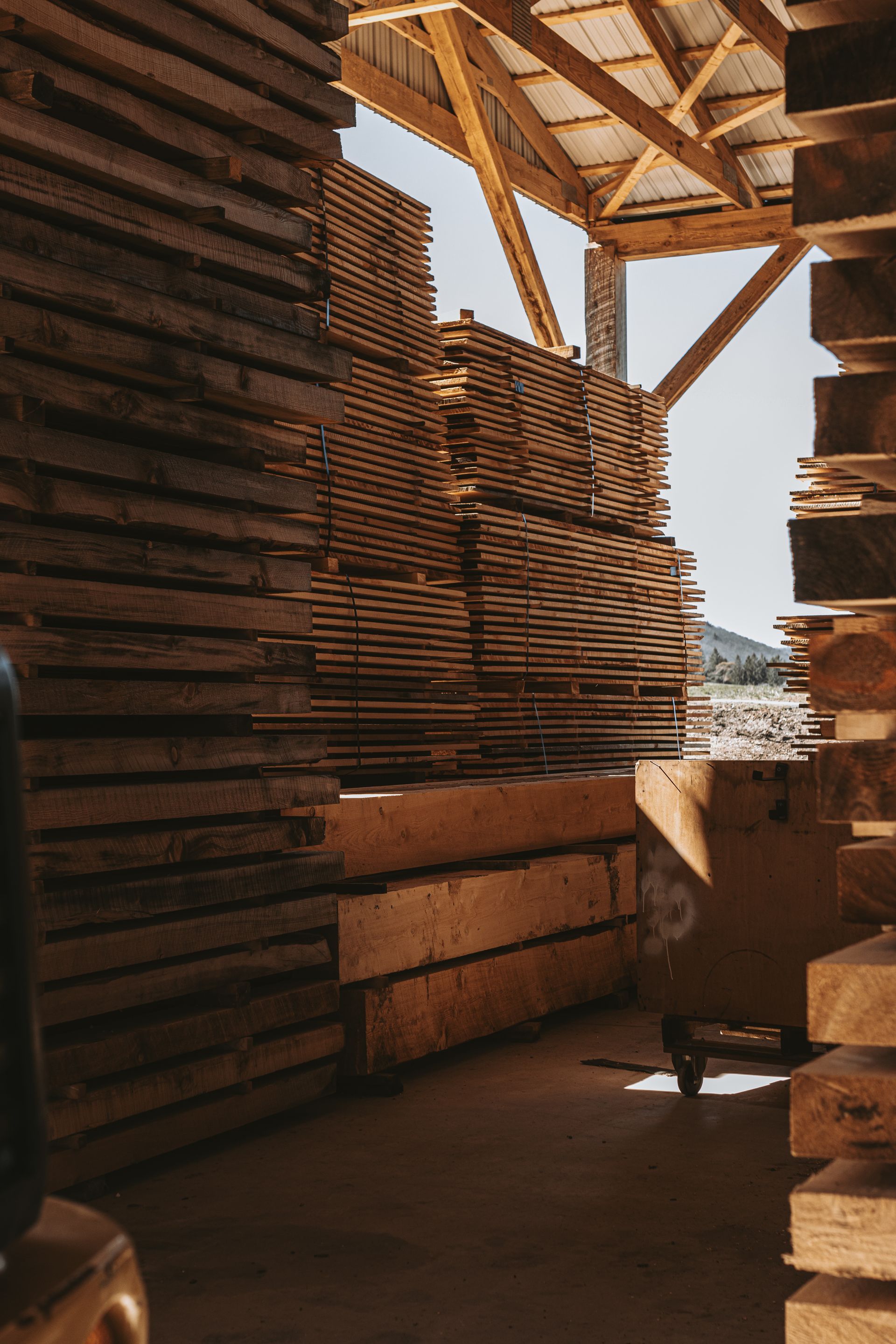 Stacked Lumber planks By Central Timber Frame Supply. 