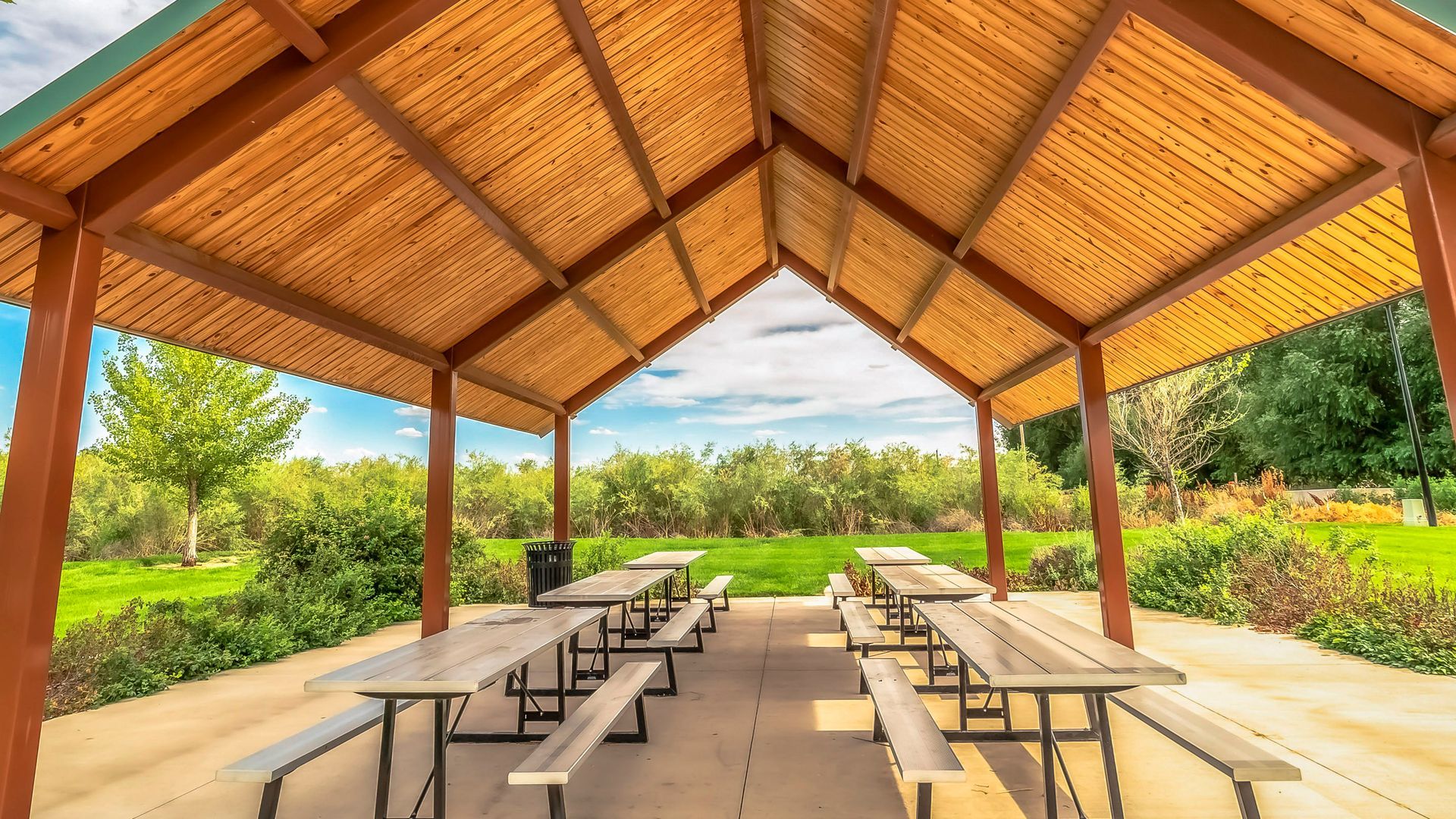 Heavy timber pavilion with picnic tables at a Pennsylvania venue.