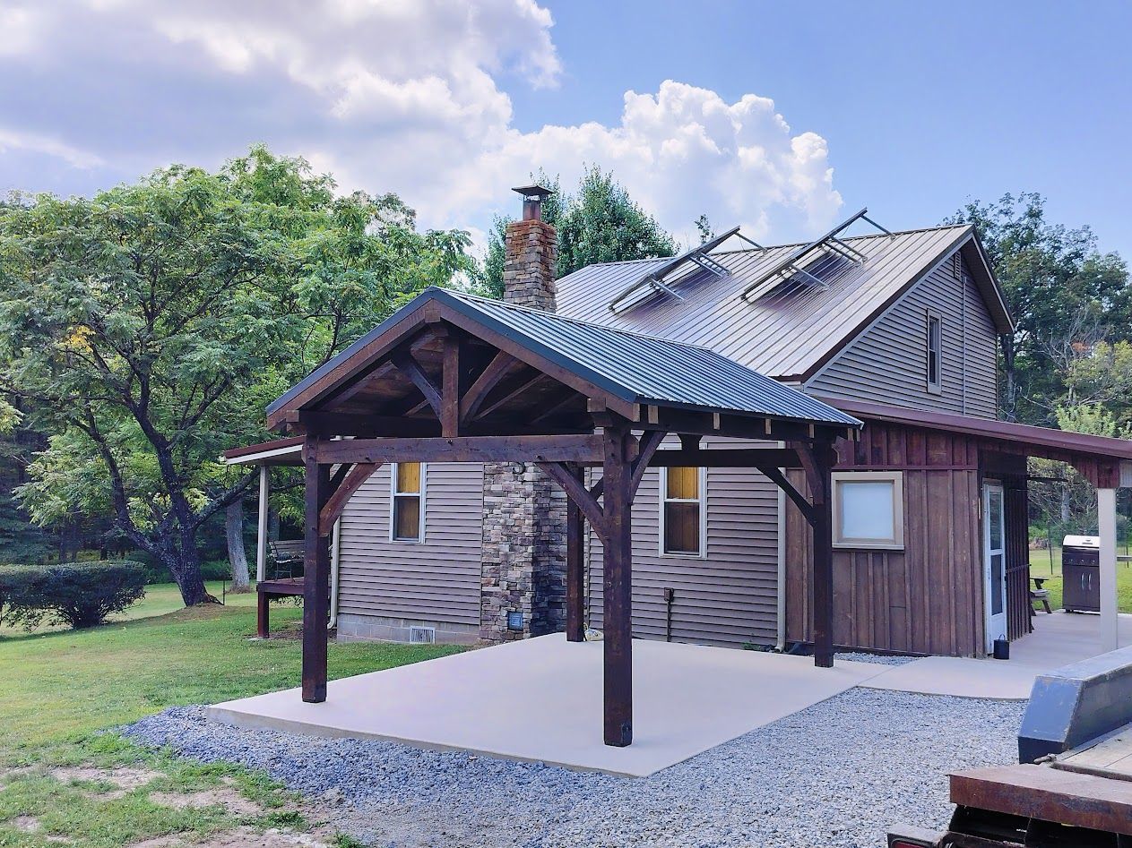 Open-air timber-framed patio structure by Central Timber Frame Supply available for wholesale across the United States