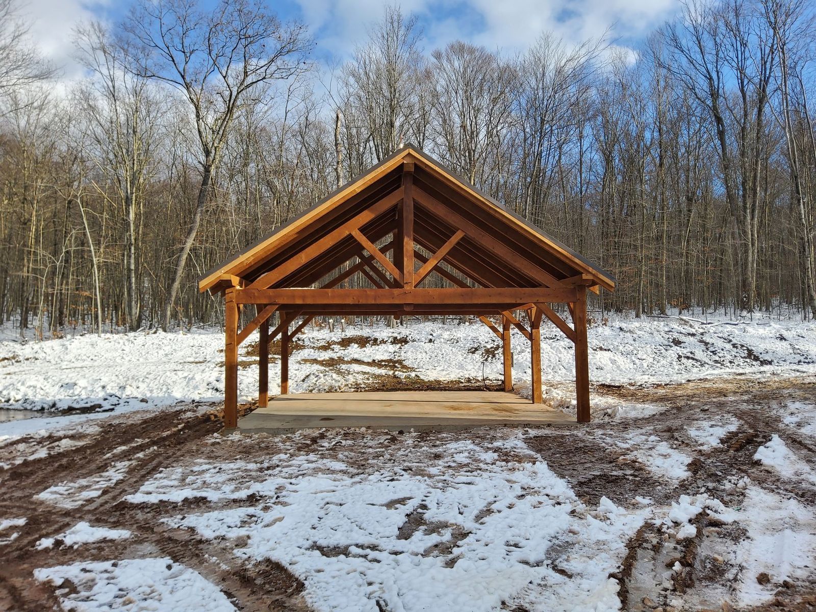 A wooden timber frame pavilion structure by Central Timber Frame Supply serving PA, WV, VA, NY, NJ 