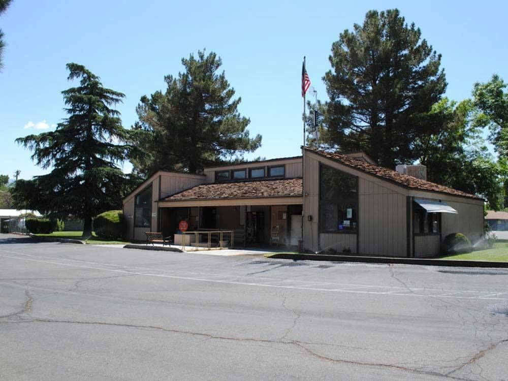 A large building with a flag on top of it