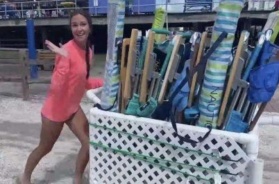 woman pushing cart