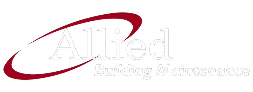 A red and white logo for allied building maintenance.