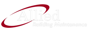 A red and white logo for allied building maintenance.