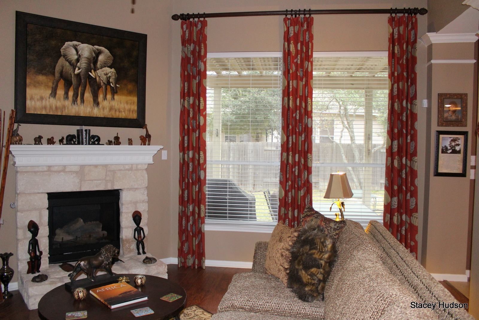 A living room with a fireplace and a couch