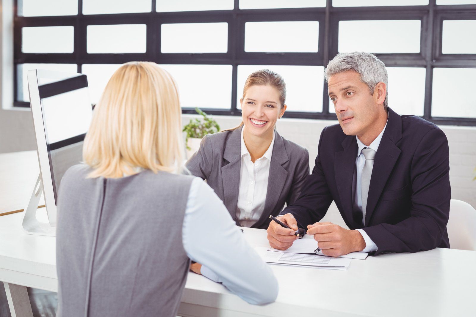 three people in the meeting