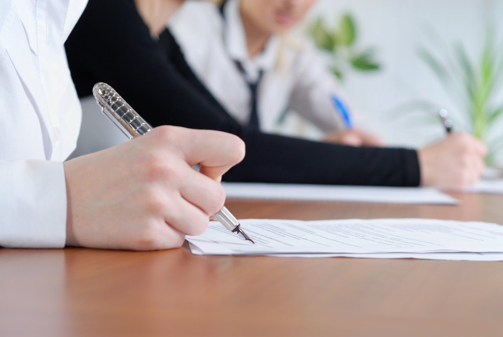 worker using a pen