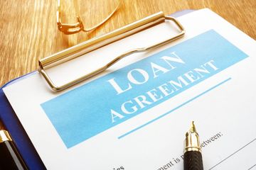 loan agreement paper in the table