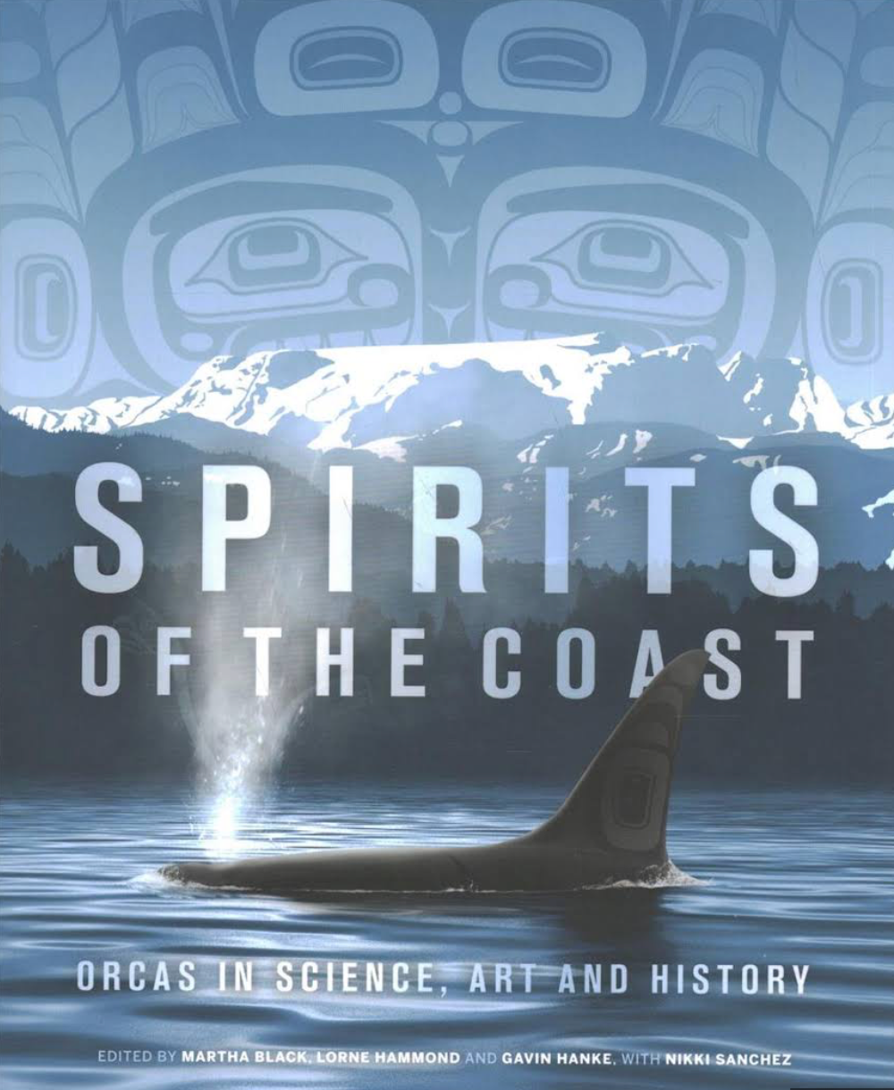 Book cover with orca breaching before snowy mountains and the title “Spirits of the Coast”