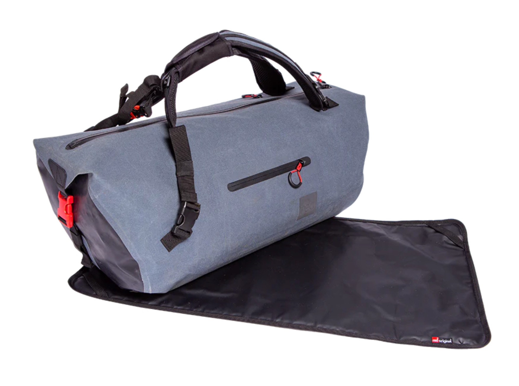 Gray duffel bag with black straps and red accents beside a black mat