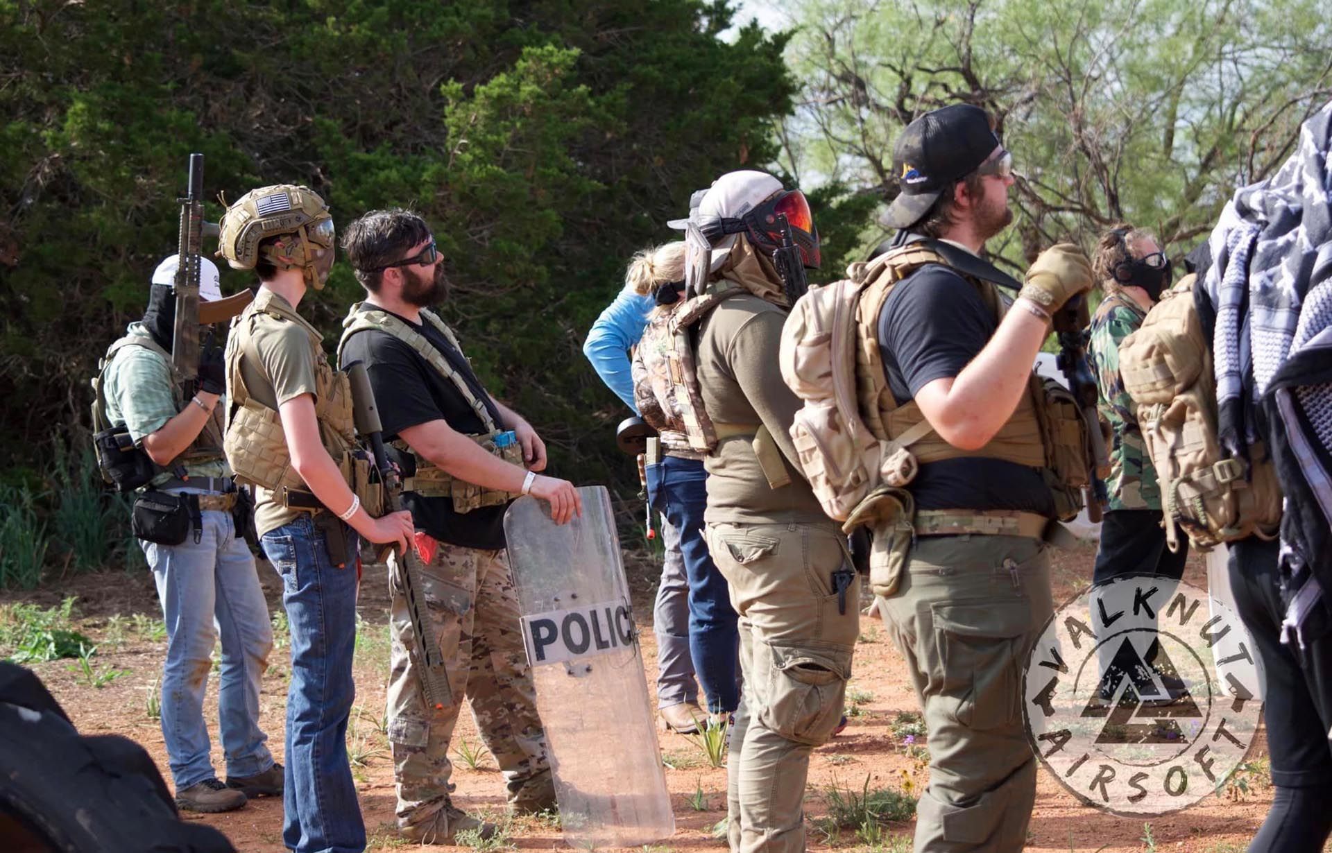 Airsoft players waiting for instructions
