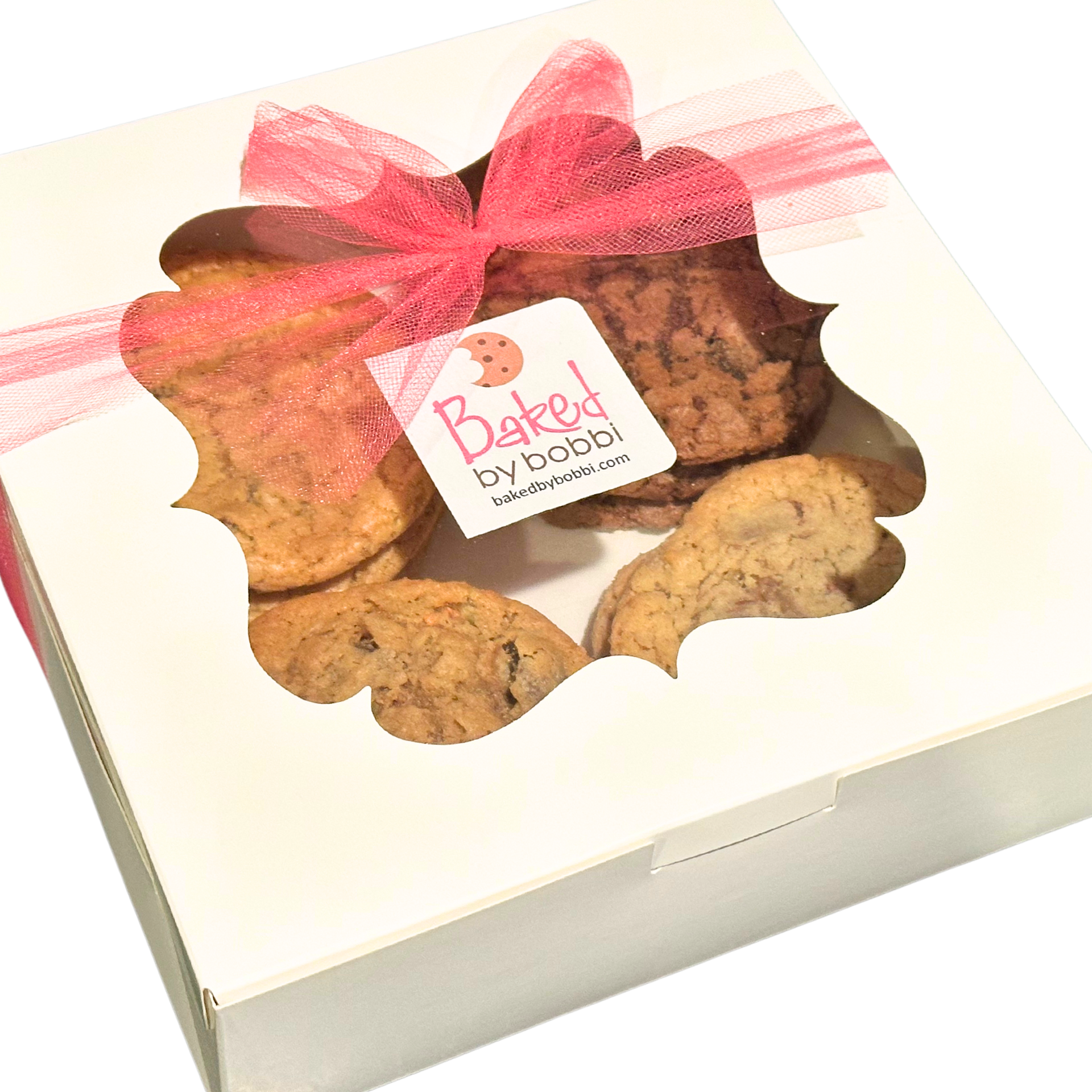 White bakery gift box with a clear window showing assorted cookies and a pink ribbon