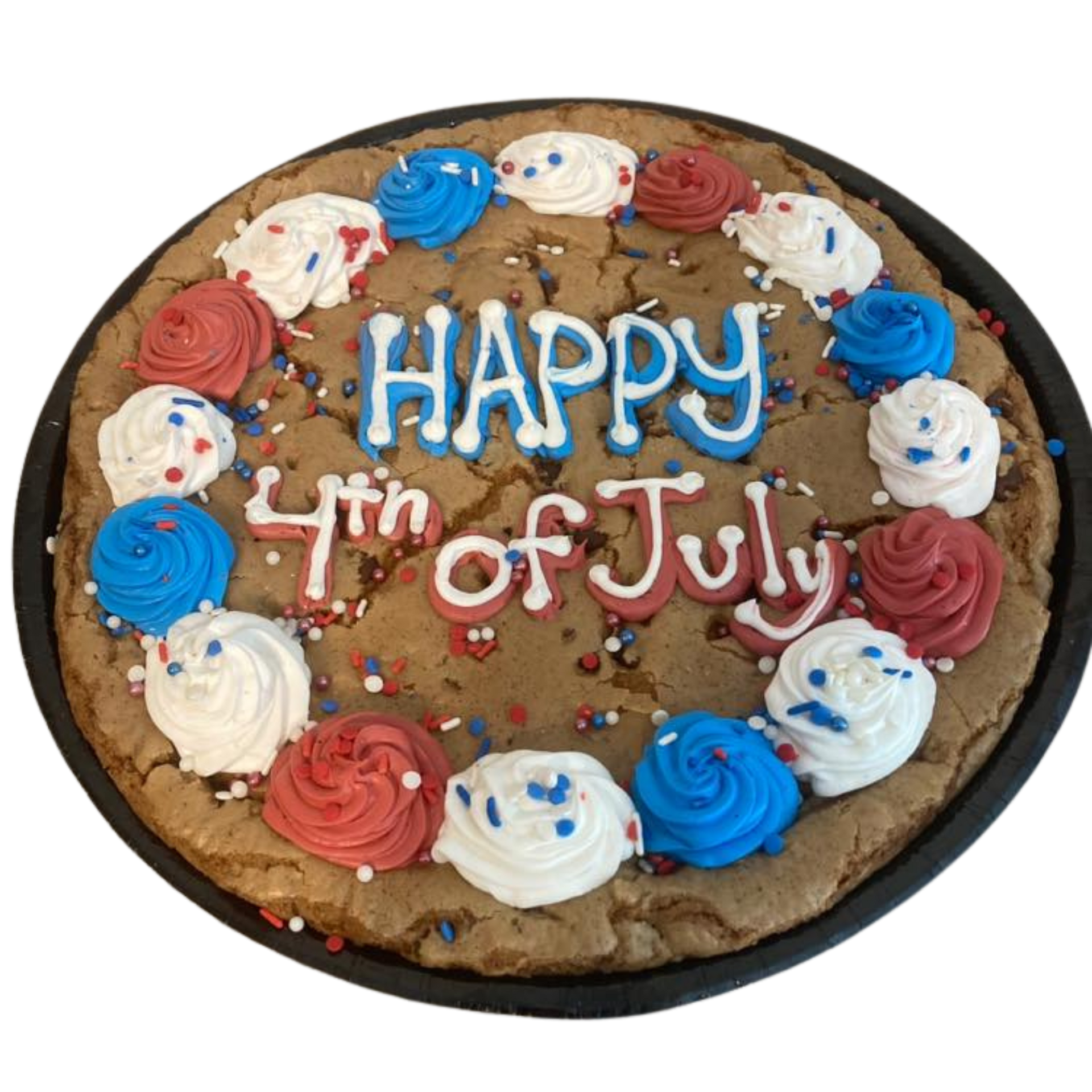 Birthday cookie cake with yellow lettering, white frosting border, and colorful sprinkles on a black tray