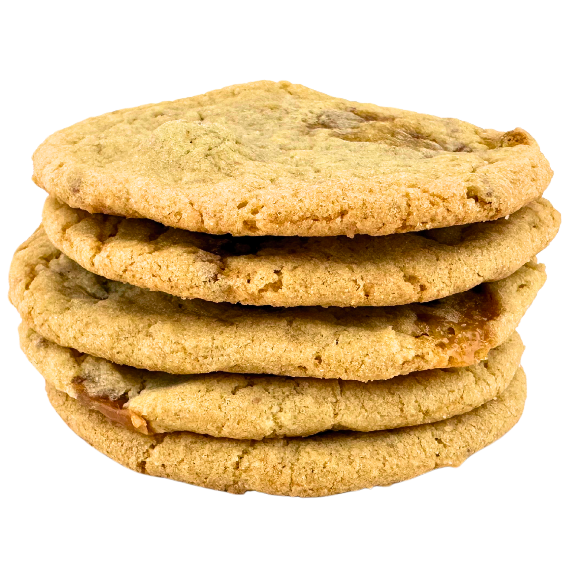 Four cookies are stacked on top of each other on a white background.