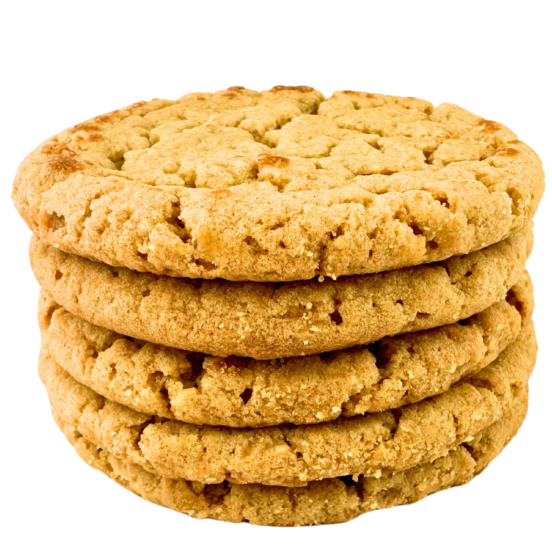Four peanut butter cookies are stacked on top of each other