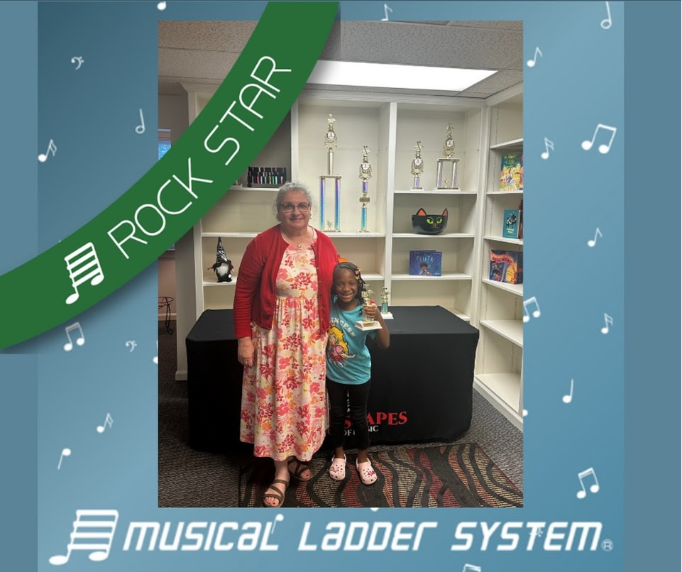Zora earned her certificate, wristband, and trophy for 1 year! Zora earned her certificate, wristband, and trophy for 1 year!