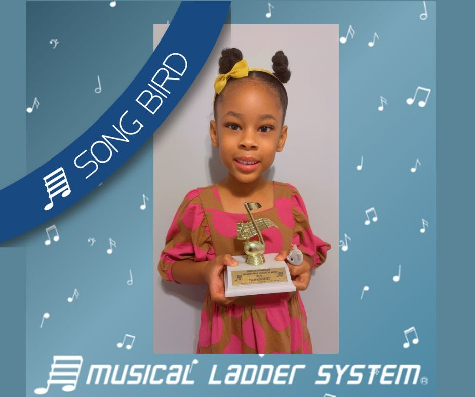 Brielle earned her certificate, wristband, and trophy for 6 months! Brielle earned her certificate, wristband, and trophy for 6 months!