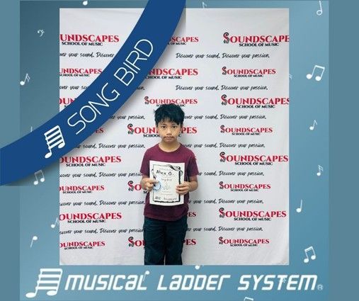 Alex earned his certificate and wristband for 6 months of piano lessons! Alex earned his certificate and wristband for 6 months of piano lessons!