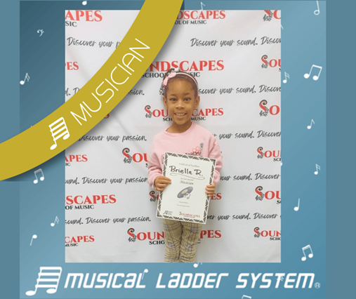 Bri earned her certificate and wristband for 9 months of piano lessons! Bri earned her certificate and wristband for 9 months of piano lessons!