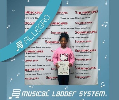 Grace earned her certificate and wristband for 15 months of violin lessons! Grace earned her certificate and wristband for 15 months of violin lessons!