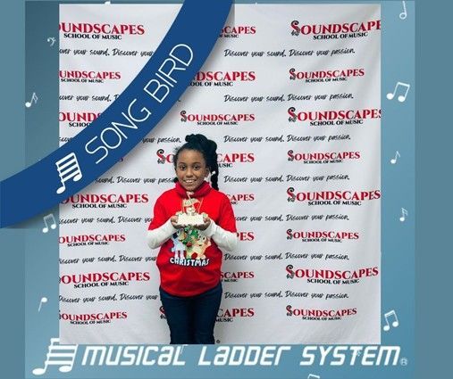 Kyndalyn earned her certificate, wristband, and trophy for 6 months of piano lessons! Kyndalyn earned her certificate, wristband, and trophy for 6 months of piano lessons!