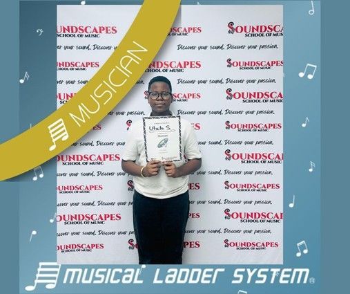 Utailo earned his certificate and wristband for 9 months of piano lessons! Utailo earned his certificate and wristband for 9 months of piano lessons!