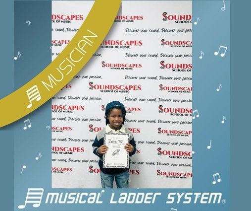 Zaire earned his certificate and wristband for 9 months of piano lessons! Zaire earned his certificate and wristband for 9 months of piano lessons!