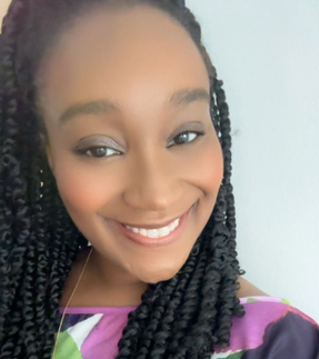 Woman with braided hair smiling Woman with braided hair smiling