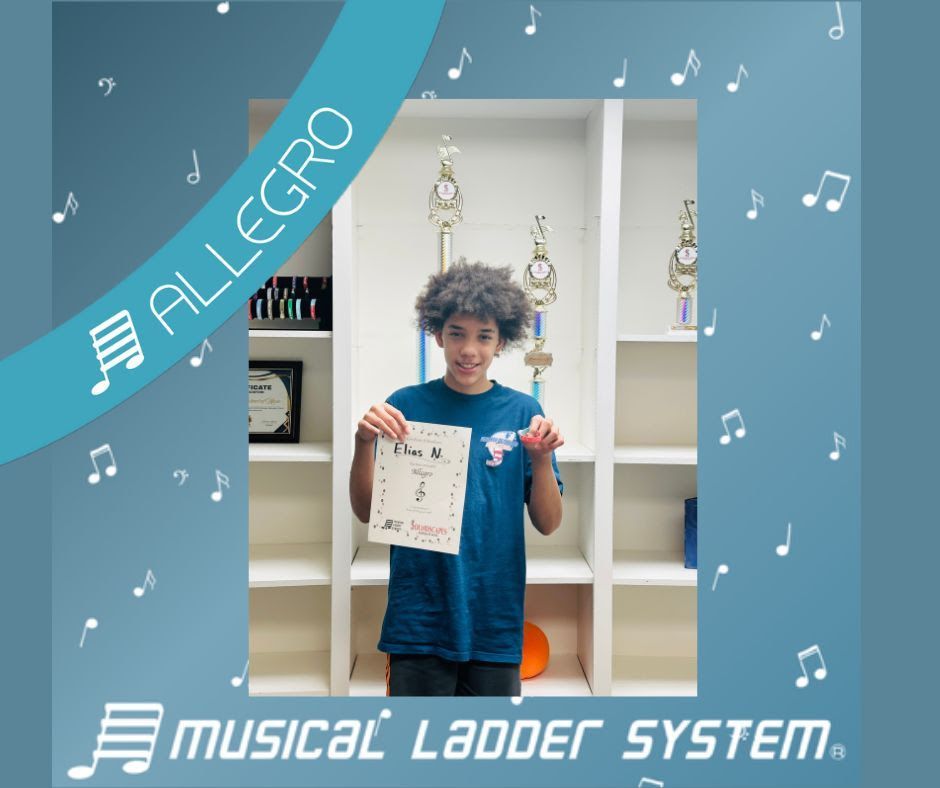Elias earned her certificate and wristband for 15 months of piano/violin lessons! Elias earned her certificate and wristband for 15 months of piano/violin lessons!
