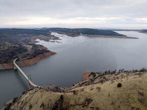 A drone view of water levels at Bidwell Bar Bridge and (Left) Bidwell Canyon Marina at Lake Oroville in Butte County, California. On this date, the water storage was 2,008,215 acre-feet (AF), 59 percent of the total capacity. Photo taken December 20, 2024.