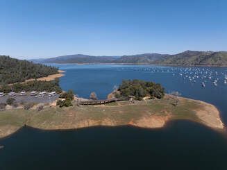 A drone view of the Historic Bidwell Bar Bridge and Lake Oroville in Butte County, California. On this date, the water storage was 2,881,527 acre-feet (AF), 84 percent of the total capacity. Photo taken March 11, 2025.