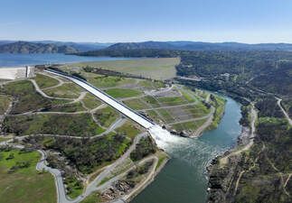 A drone view of Oroville Dam and main spillway at Lake Oroville in Butte County, California. Photo taken March 11, 2025. On this date, the water storage was 2,881,527 acre-feet (AF), 84 percent of the total capacity.
