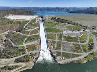 A drone view of Oroville Dam and main spillway at Lake Oroville in Butte County, California. Photo taken March 11, 2025. On this date, the water storage was 2,881,527 acre-feet (AF), 84 percent of the total capacity.